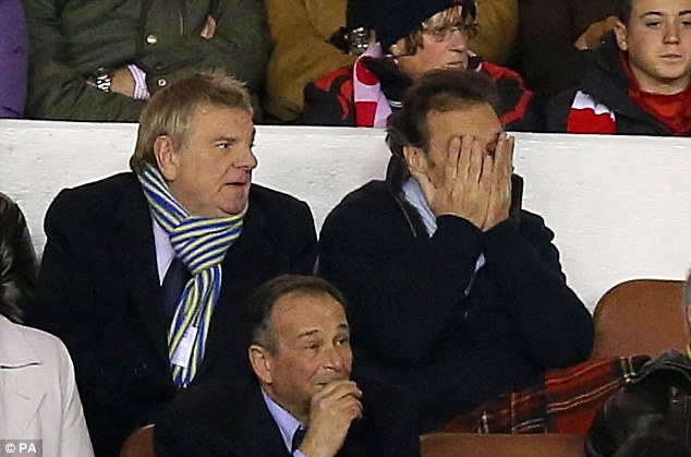 Players' Liaison Officer Stix Lockwood with an unimpressed Massimo Cellino during the 1-1 draw at Forest on 20 December