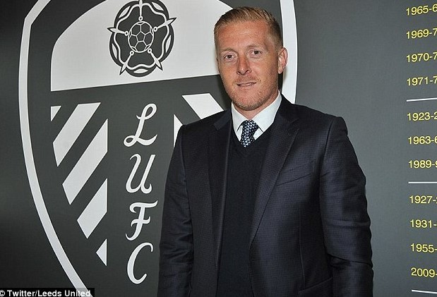 Garry Monk poses for cameras as he is introduced as the new man in the hot seat