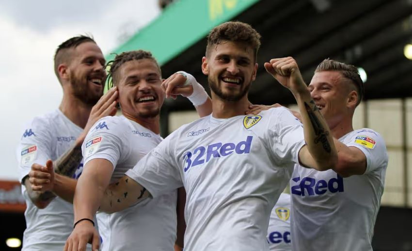 Jansson, Phillips, Klich and Alioski celebrate an outstanding victory at Norwich 25 August 2018
