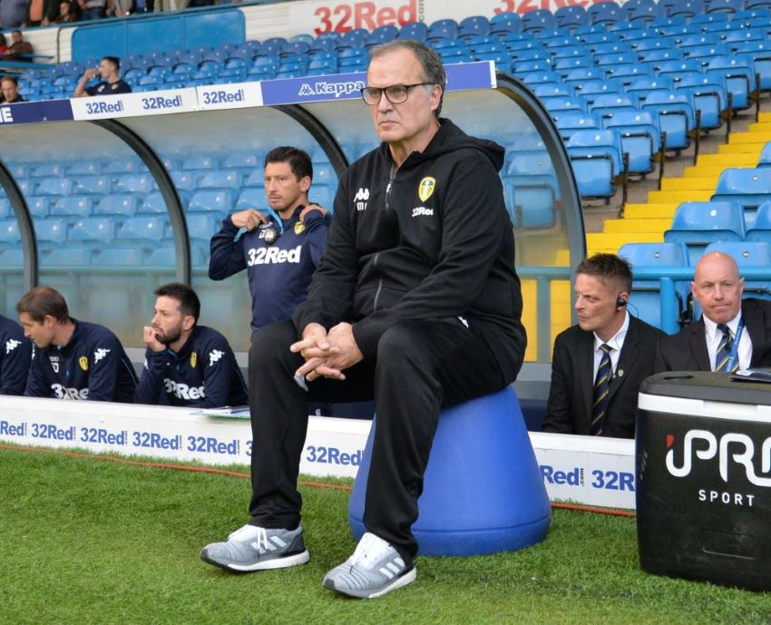 Marcelo Bielsa in characteristic pose on his blue bucket. He was a game changer for Leeds United