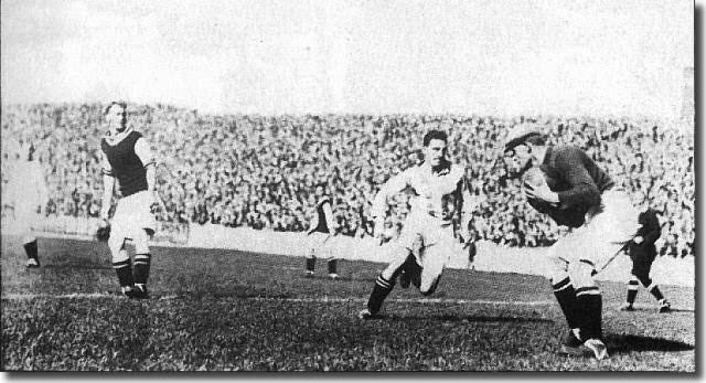 Tom Jennings in action against Villa 1926-27.  Jennings hit a record 35 goals for United as the club lost its First Division status