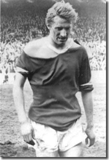 Denis Law after a love in with Jack Charlton in a bitter Cup semi final in 1965