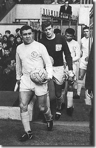 Bobby Collins leads out the United side into the brave new world of the First Division