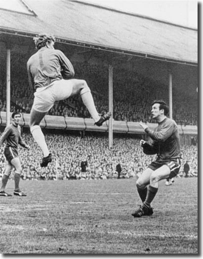 Leeds United goalkeeper Gary Sprake leaps to catch a cross as Chelsea's John Boyle tries to protect himself from Sprake's dangerous high kick - the forward was laid out after the impact