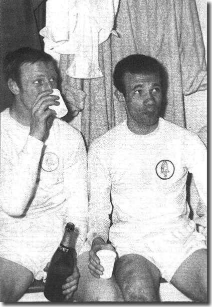 Jack Charlton and Paul Reaney celebrate after Leeds’ victory over Nottingham Forest which gave United a First Division record of 67 points and the title