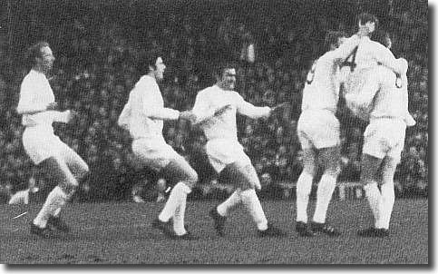 Jack Charlton, Peter Lorimer, Terry Cooper, Mick Jones and Allan Clarke celebrate with Billy Bremner after his semi final winner against Manchester United