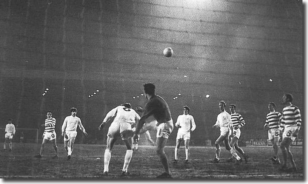 Celtic keeper Evan Williams clears the ball under pressure from Allan Clarke