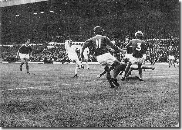 Billy Bremner slots home a goal in the 3-2 defeat of champions Everton