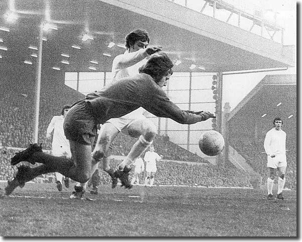 Allan Clarke and Liverpool keeper Ray Clemence tangle in a tense FA Cup-tie at Anfield