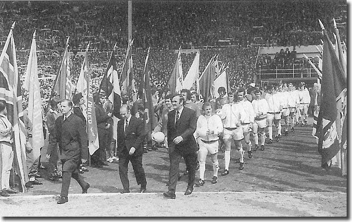 Bertie Mee and Don Revie lead out their teams after the winners' parade