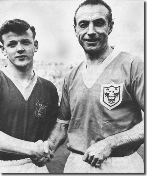 The youthful Billy Bremner shakes hands with the great Stanley Matthews before the Leeds-Blackpool game  on 5 March - Leeds lost 4-2