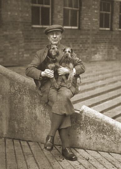 Buckley in typical pose with his beloved fox terriers