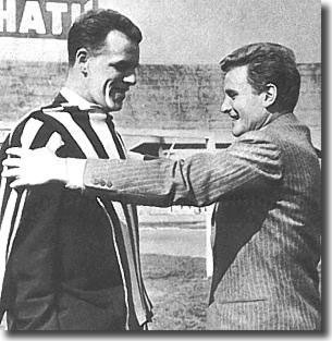 Juventus skipper Boniperti tries a Juventus shirt for size on his new team mate