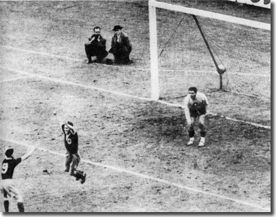 Bobby Collins jumps for joy after netting the winner against the Swiss in a World Cup qualifier in Basle in May 1957. It was his first international goal