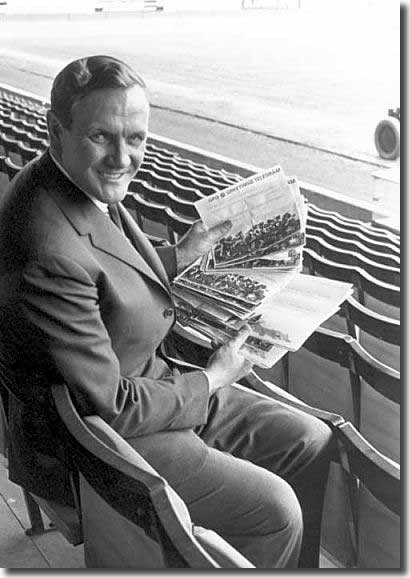 Don Revie at the Elland Road ground. He is seen holding telegrams congratulating him on his team winning the League championship with a record 67 points
