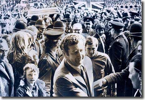 Freddie Goodwin being congratulated by fans on the St Andrews pitch after keeping Birmingham up on the last day of the 1973/74 season - Goodwin signed Hibbitt for the Blues a year later