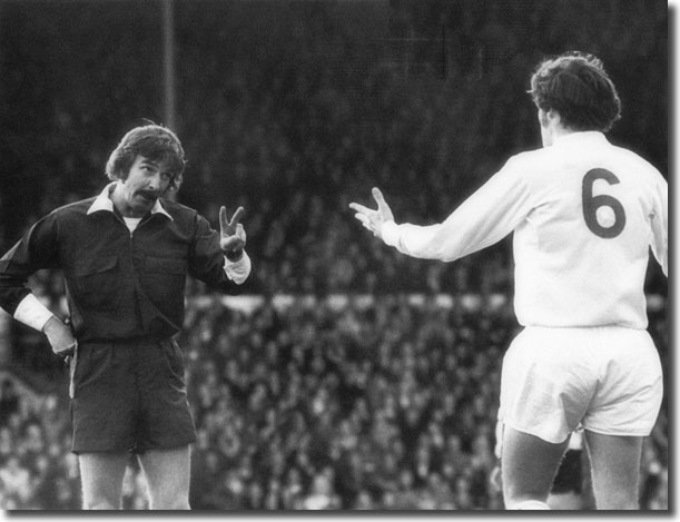 The players' favourite referee, Gordon Hill, gives Norman Hunter due warning that enough is enough