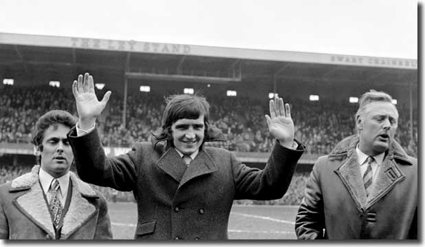 Ian Storey-Moore, flanked by club secretary Stuart Webb and assistant manager Peter Taylor, is paraded round the Baseball Ground as Derby's new signing