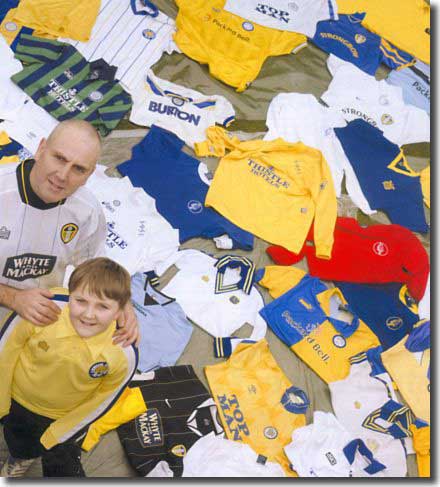 Leeds United fan Paul Waite with his 11-year-old son Alex and his collection of Leeds shirts as pictured in the March 2006 edition of the Leeds Leeds Leeds magazine