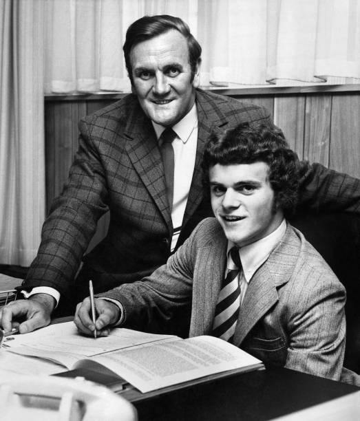 Leeds legend Don Revie poses with David McNiven as he signs for Leeds United in May 1971 