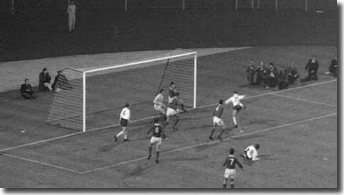 Alan Peacock on the right hooks home the winner for England against Northern Ireland on 10 November 1965