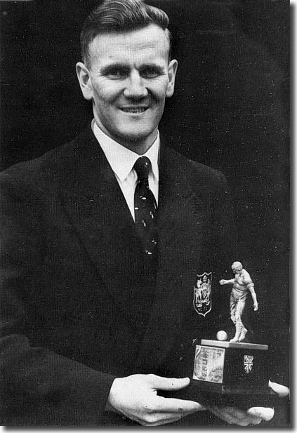 Don Revie proudly displays the Footballer of the Year Award he won in 1955