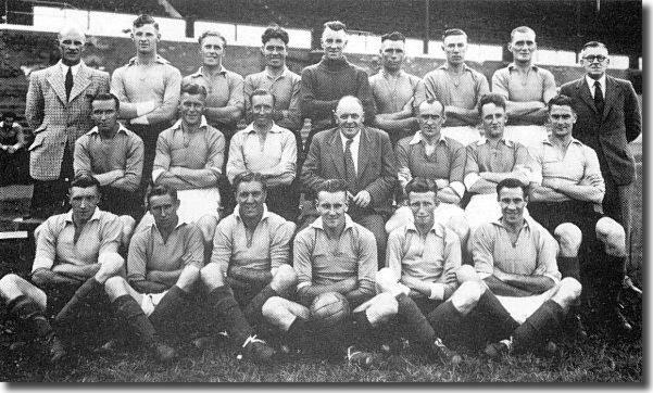 Revie (front row, fourth from left) in front of one of his mentors, Leicester City manager Johnny Duncan