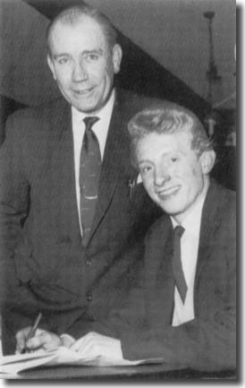 Manchester City boss Les McDowall with Denis Law as the Scot signs for City in 1960 - the manager's relationship with Revie was often strained