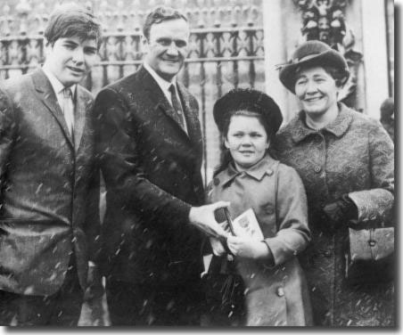 Don Revie after receiving his OBE at Buckingham Palace, with wife Elsie and children Duncan (15) and Kim (10)